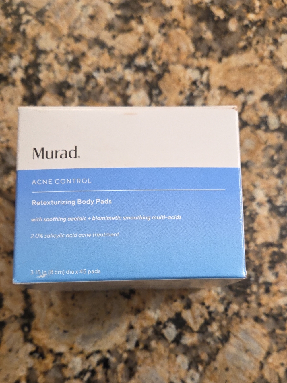 Murad Retexturizing Body Pads in Blue and White